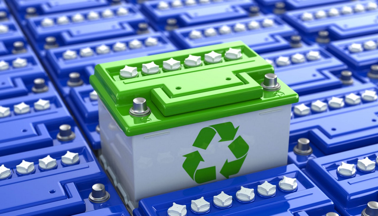 An image of a recycled battery among rows of non-recycled batteries